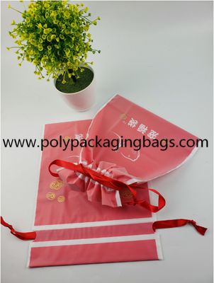 Le coton en plastique de cordon recyclable Ropes les sacs/femmes et les enfants tous comme le sac rouge de cadeau de nouvelle année