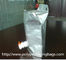 Le sac réutilisable de papier d'aluminium tiennent la poche avec le bec pour le support de vin vers le haut des sacs de BAVOIR avec la broche
